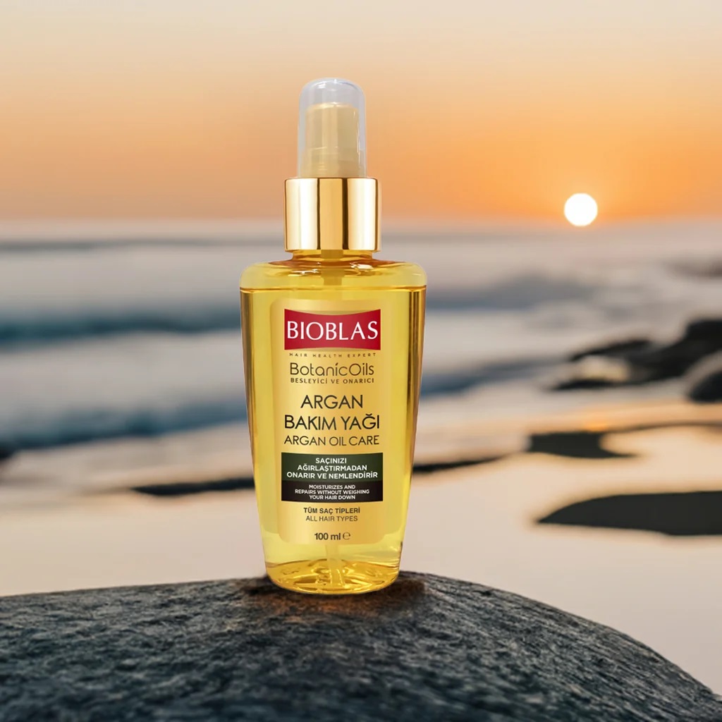 BIOBLAS BOTANIC OILS ARGAN OIL.. Bioblas Argan Oil applied to hair for shine and hydration